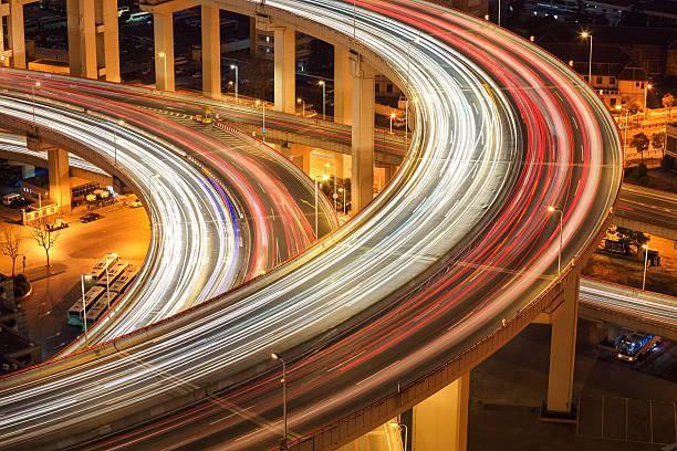 istock closeup of the light trails on overpass 488694373