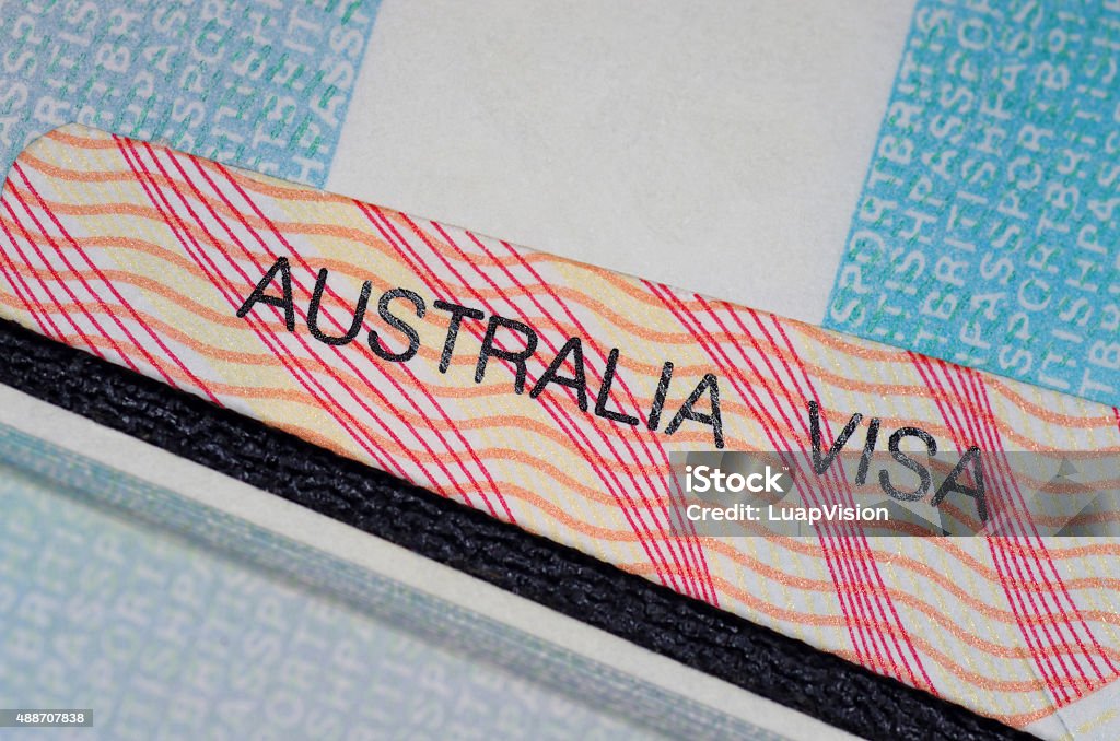 australian visa australian visa in between two british passport pages  Australia Stock Photo