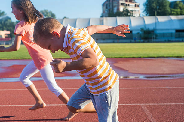 istock Happy girl and boy run 488708842
