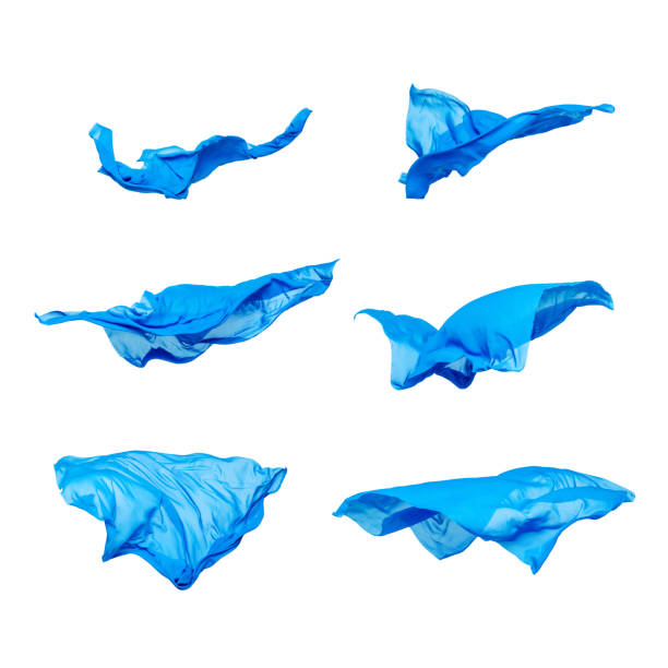 abstract pieces of fabric flying, isolated on white, design element