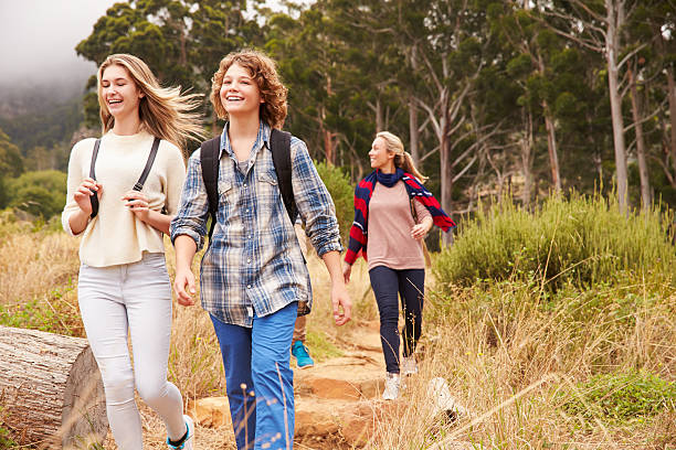 istock Happy family walking out of a forest 488711794