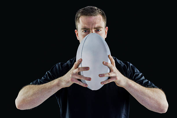 istock Rugby player holding a rugby ball 488711802