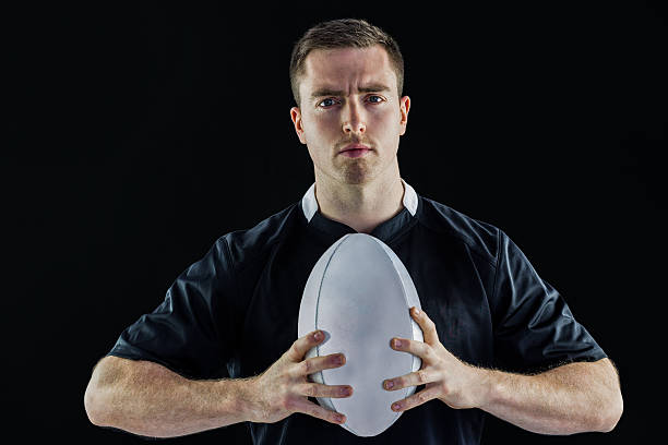 istock Rugby player holding a rugby ball 488711848
