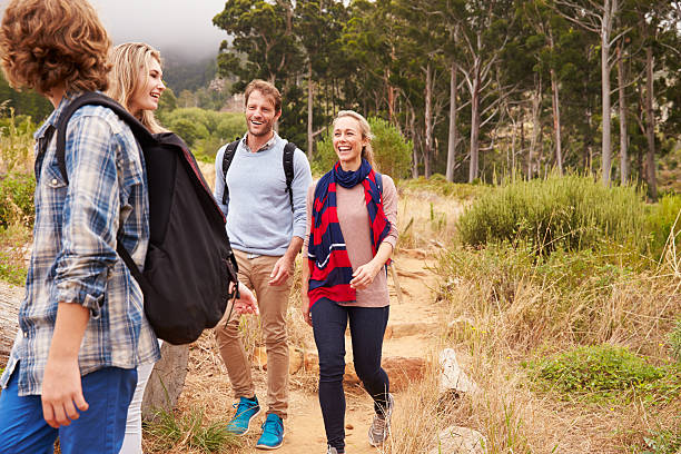 istock Happy family walking out of a forest 488712092
