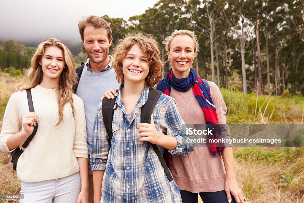 Happy family outdoor portrait in a forest Family Stock Photo