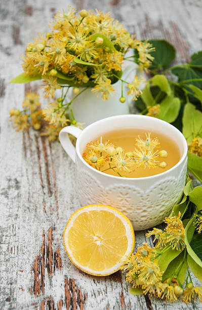 istock cup of herbal tea with linden flowers 488713638
