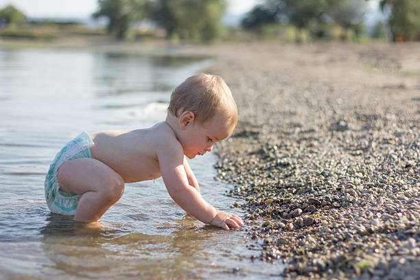 Baby boy in shallow