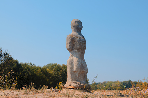 stone statue of a woman on the hill , Ukraine