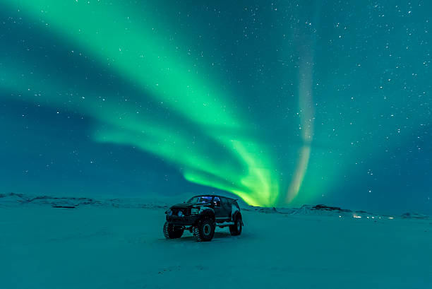 istock Northern lights over truck 488716066