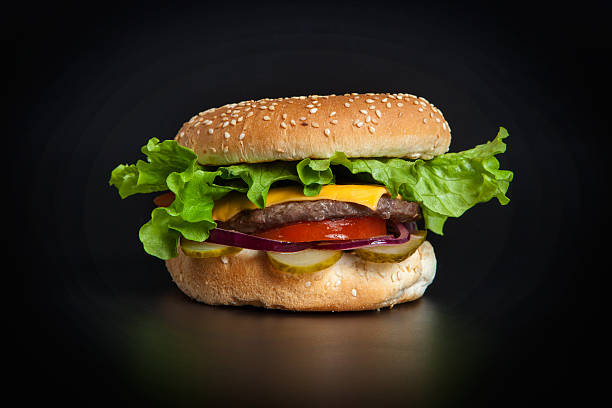 istock Meat burger with fresh vegetables and cheese 488718742