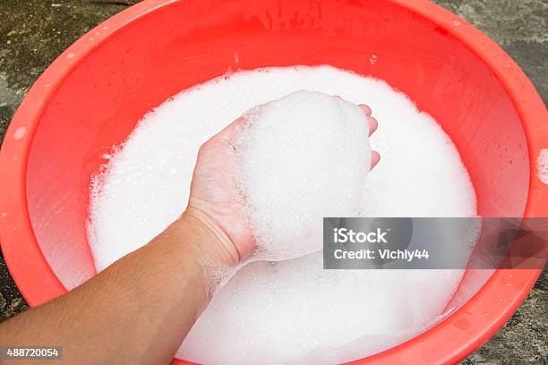Hand Washing Clothes With Soapy Water Stock Photo - Download Image Now - 2015, Abstract, Accessibility