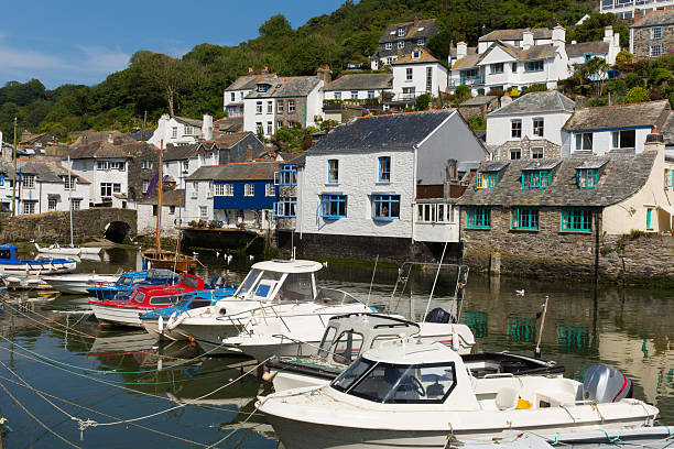 istock Boats in Polperro harbour Cornwall England UK 488720185
