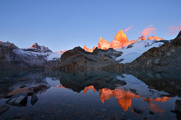 Laguna de Los Tres and mount Fitz Roy at sunrise Laguna de Los Tres and mount Fitz Roy, Dramatical sunrise, Patagonia, Argentina. fitzroy range stock pictures, royalty-free photos & images