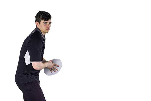 istock Rugby player about to throw a rugby ball 488722618