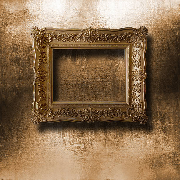 istock Old gilded picture frame for  portrait on  shabby cement wall 488723747