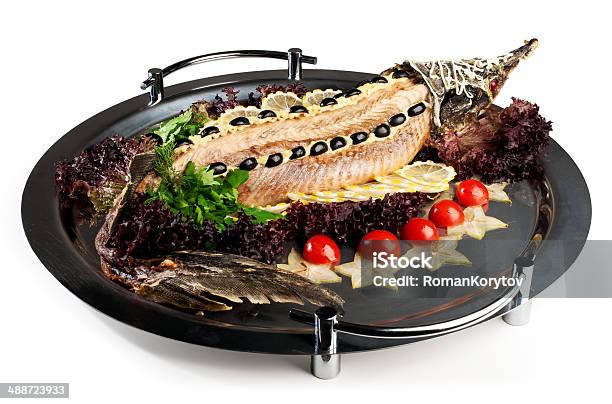 Sturgeon Cooked Entirely Stock Photo - Download Image Now - Appetizer, Arugula, Baked