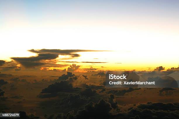 Sunset On The Clouds Stock Photo - Download Image Now - Airplane, Blue, Cloud - Sky