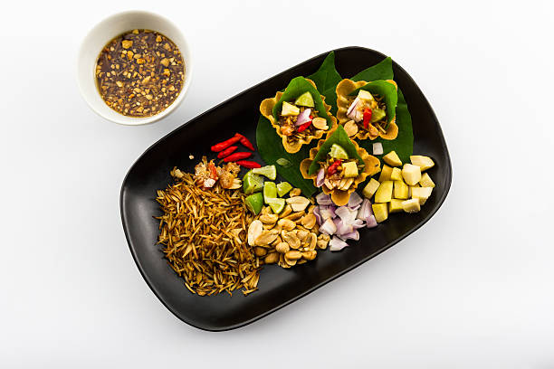 istock Leaf wrapped bite size appetizer,Traditional Thai food. 488724931