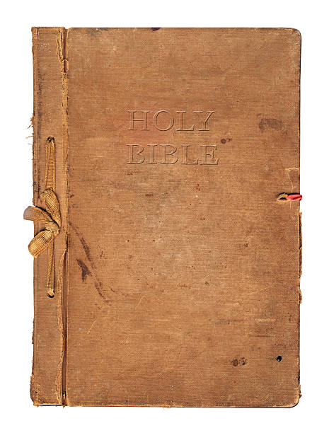 istock Old worn book cover with ribbon and bow 488725349