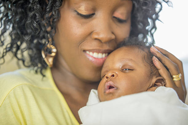 istock Content Mother and Child Sitting Together 488755026