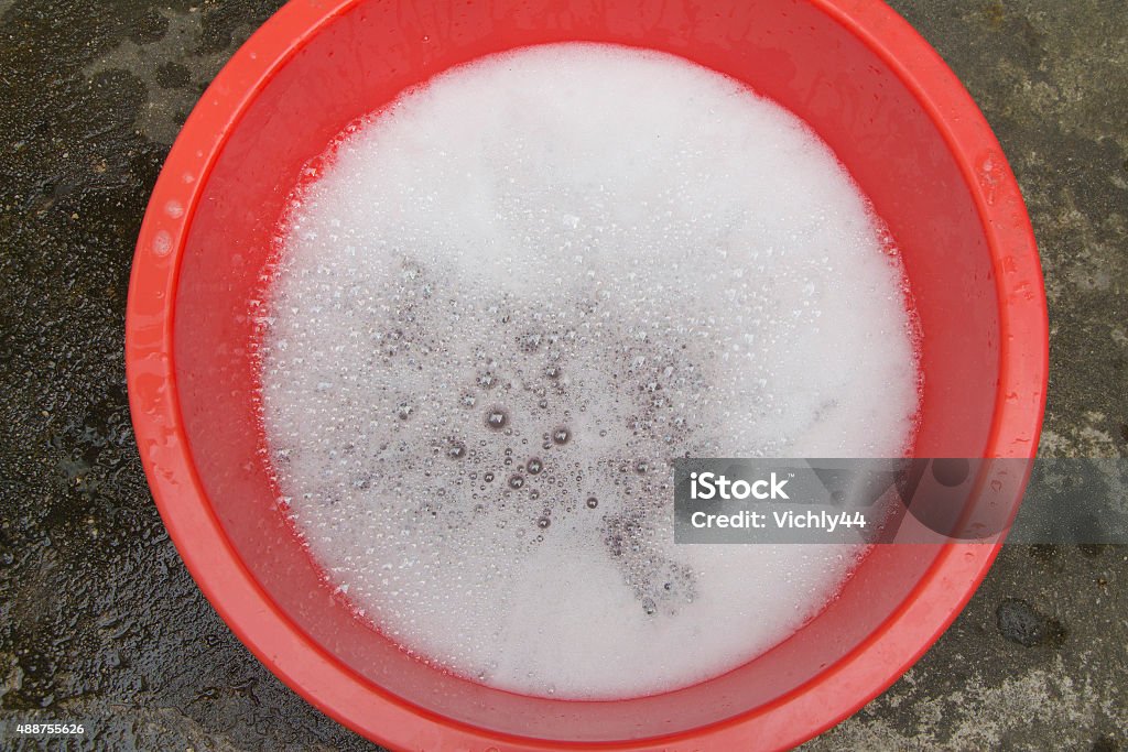 Hand washing clothes with soapy water 2015 Stock Photo
