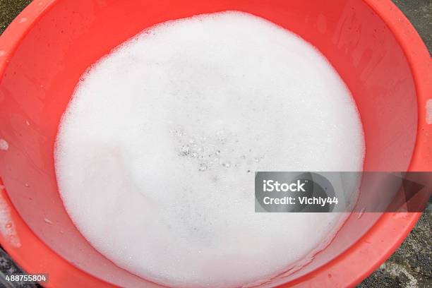 Hand Washing Clothes With Soapy Water Stock Photo - Download Image Now - 2015, Abstract, Accessibility