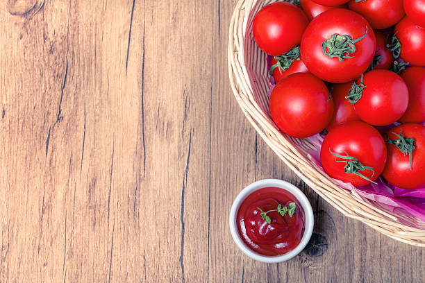 istock bowl of tomato sauce ketchup and tomatoes 488756356