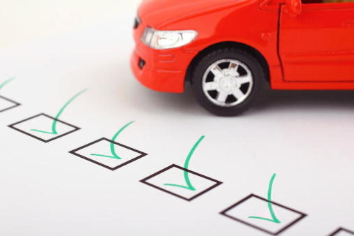 Checklist with car
