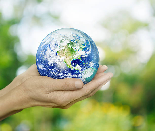 istock Earth in hands, Elements of this image furnished by NASA 488757610