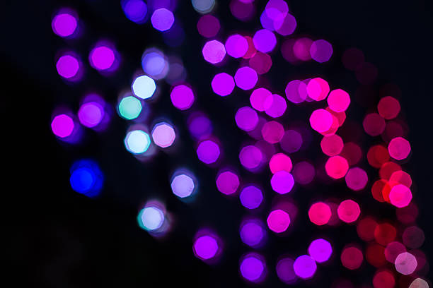 istock glitter vintage lights background. dark gold and black. defocused 488758172