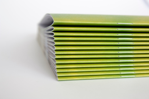 A stack of green magazines