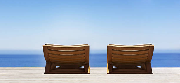 istock Beautiful beach with chaise lounge 488758465