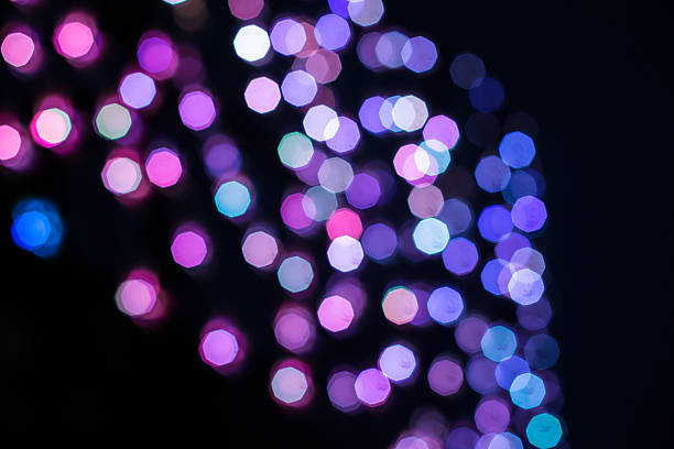 istock glitter vintage lights background. dark gold and black. defocused 488758476
