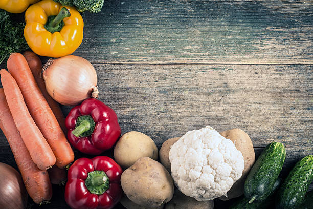 istock Vegetables on wood background. Organic food. 488758523