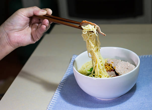 istock Yellow noodles with minced and roasted red pork 488759748