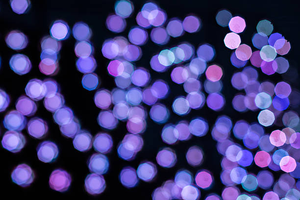 istock glitter vintage lights background. dark gold and black. defocused 488760270