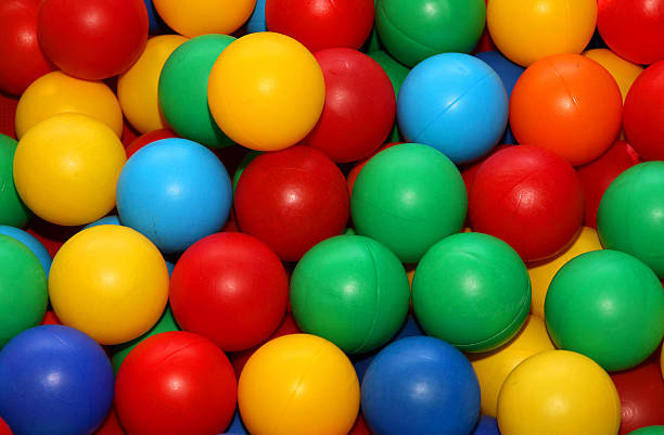 istock colored balls for play fun in a swimming pool 488760627