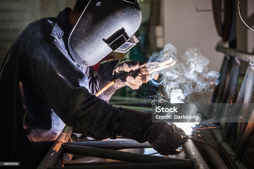 welder welder is welding metal with heat Welder Stock Photo