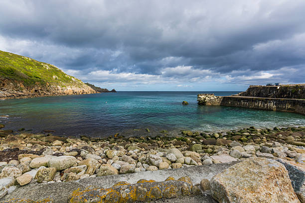 lamorna cove  breakwater at Cornwall shattered breakwater of lamorna cove at  Cornwall lamorna cove stock pictures, royalty-free photos & images