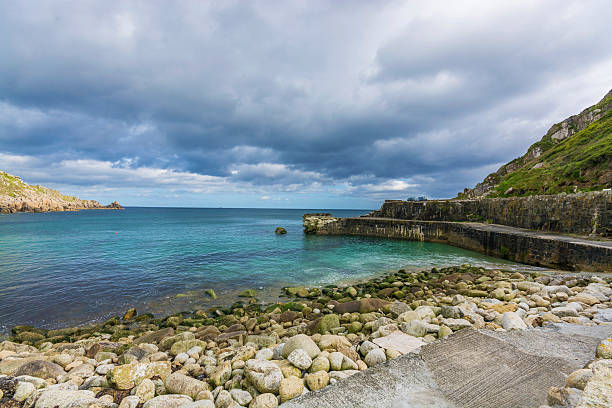 lamorna cove  breakwater at Cornwall shattered breakwater of lamorna cove at  Cornwall lamorna cove stock pictures, royalty-free photos & images