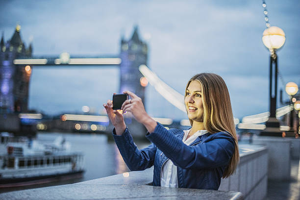 istock Taking photograph on smartphone in London 488762612