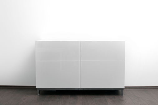 white modern chest of drawers in bright minimalism interior