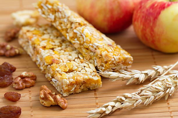 istock Cereal bars of granola with apples, nuts and raisins 488763198
