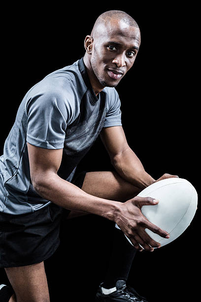istock Portrait of confident rugby player with ball 488763572