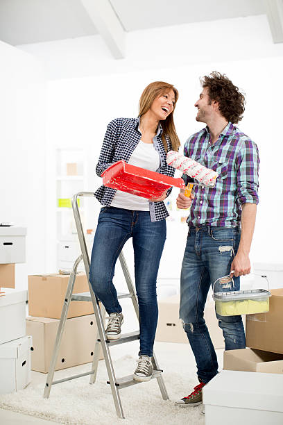 istock Young couple renovating apartment. 488763799