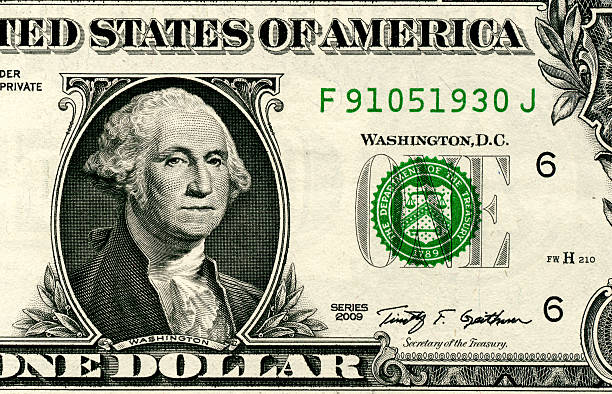 istock Close up of one dollar isolated on white background 488765352