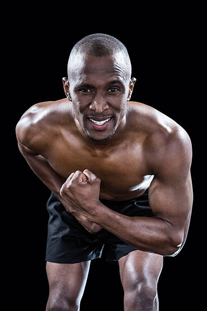 istock Portrait of muscular man flexing muscles 488766388