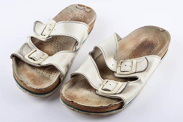 istock White Dirty Old European Slippers 488769104