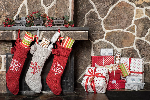 istock Christmas stockings  and presents 488769440