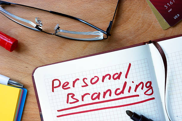 istock Notepad with Personal Branding  on office wooden table. 488770842